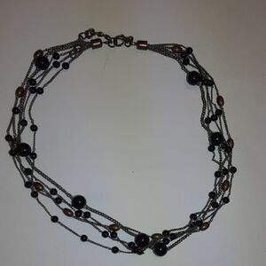 Silver and Goldish Accent Necklace With Black Beads